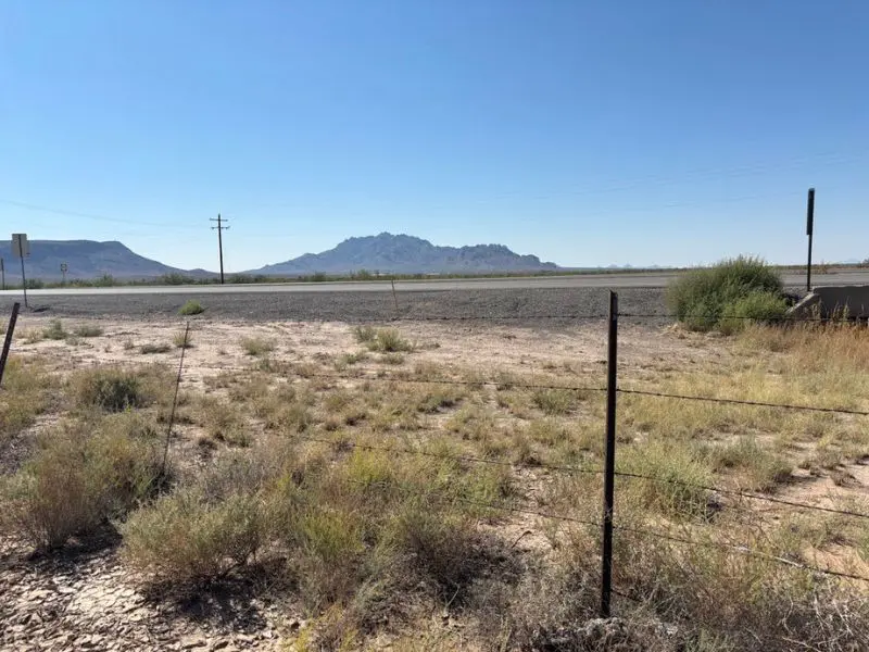 a fence in a desert