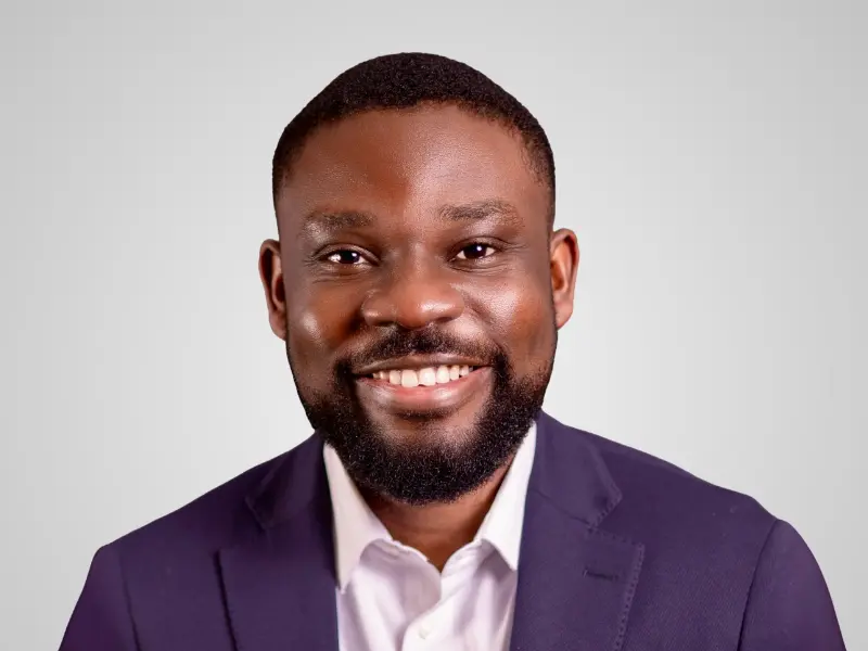 Studio headshot of Reason Abajuo, Chaberton's chief legal officer